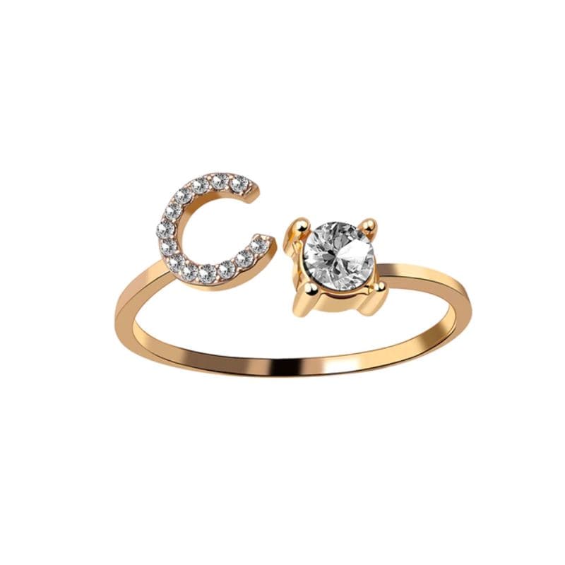 Ring mit Buchstabe und Zirkonia Stein