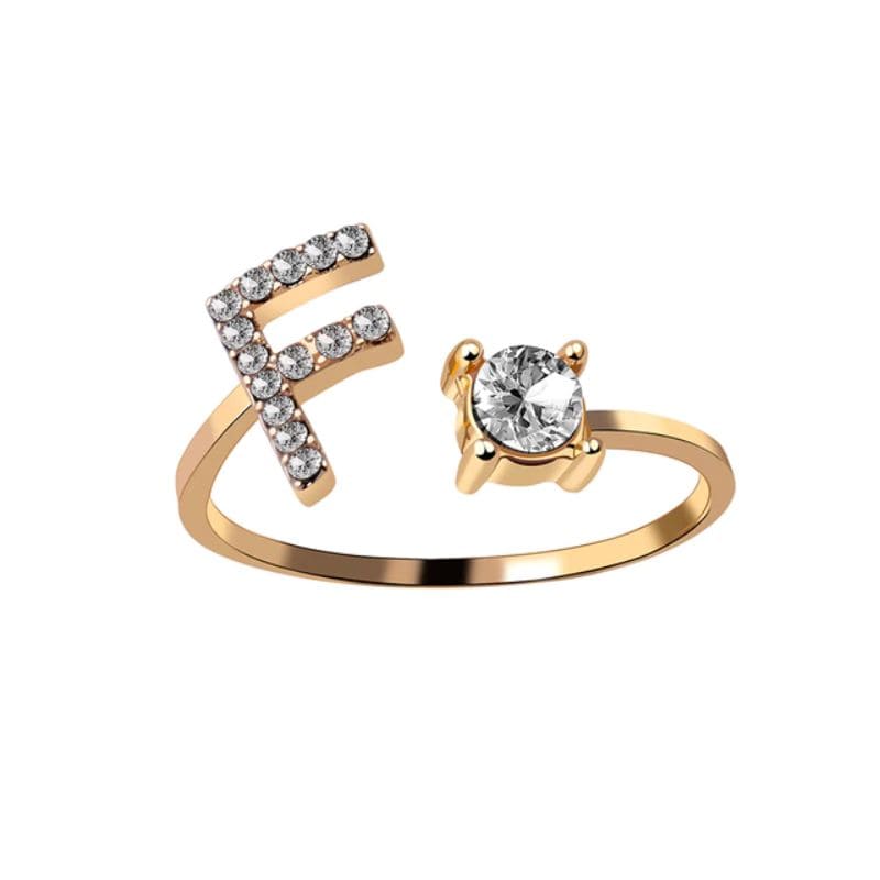 Ring mit Buchstabe und Zirkonia Stein