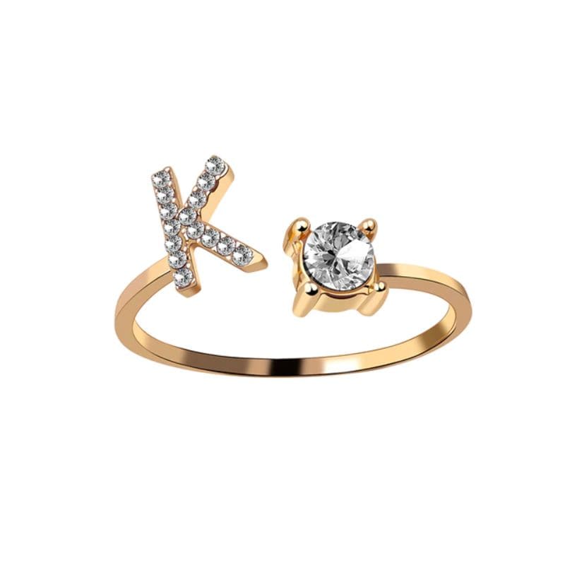 Ring mit Buchstabe und Zirkonia Stein