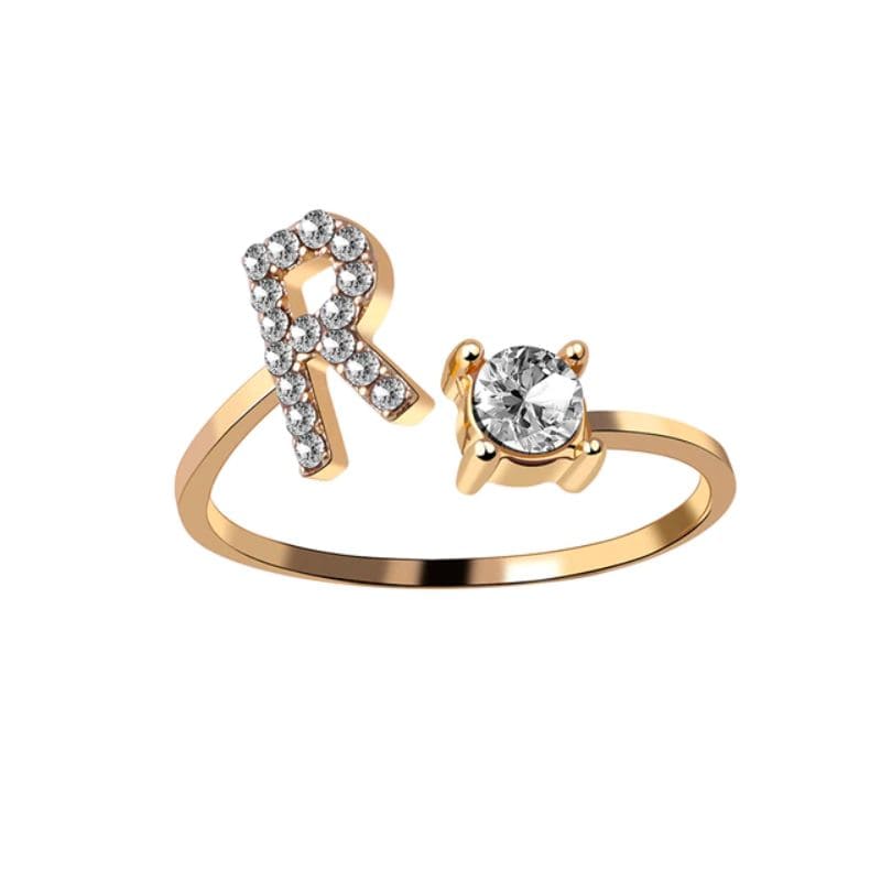 Ring mit Buchstabe und Zirkonia Stein