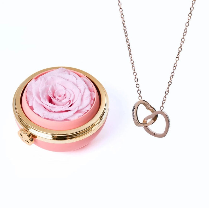 Ewige Rose unter Glaskuppel mit Kette
