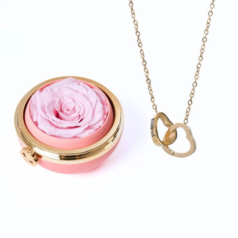Ewige Rose unter Glaskuppel mit Kette