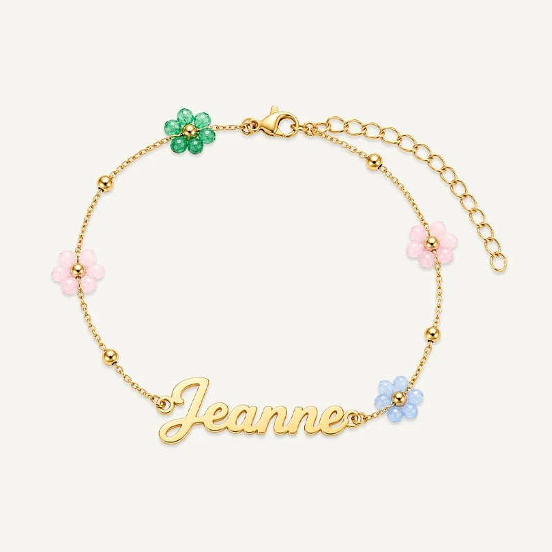 Kinderarmband mit Namen und bunten Blumen