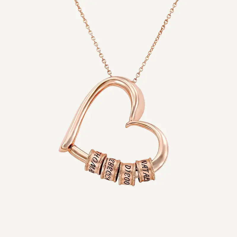Herzkette mit gravierten Ringen und Namen