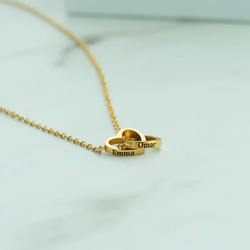 Set aus Kette und Armband mit verschlungenen Herzen