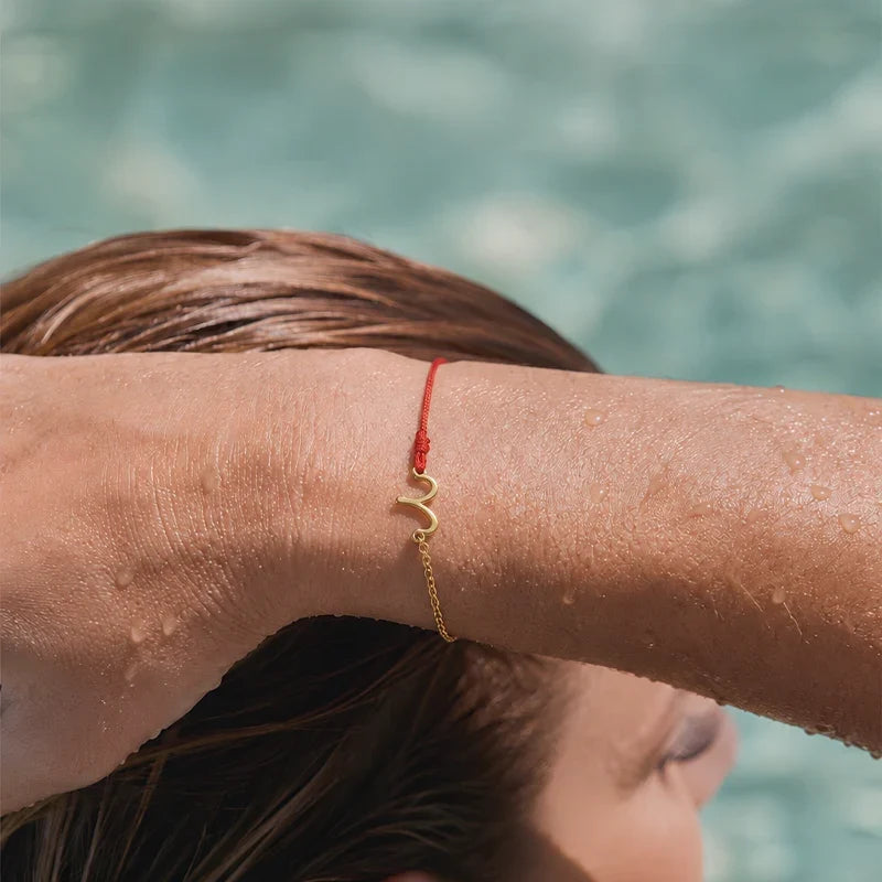Sternzeichen Armband mit roter Schnur und Kette