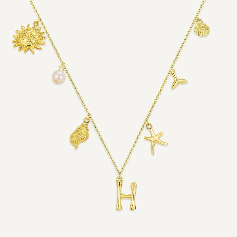Buchstabenkette mit Muschel Charms