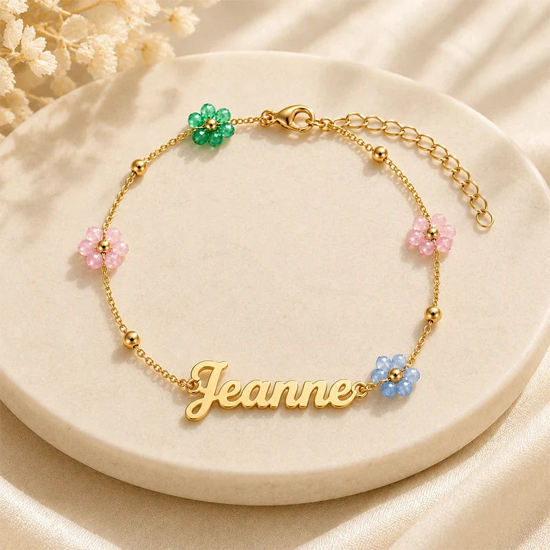 Kinderarmband mit Namen und bunten Blumen