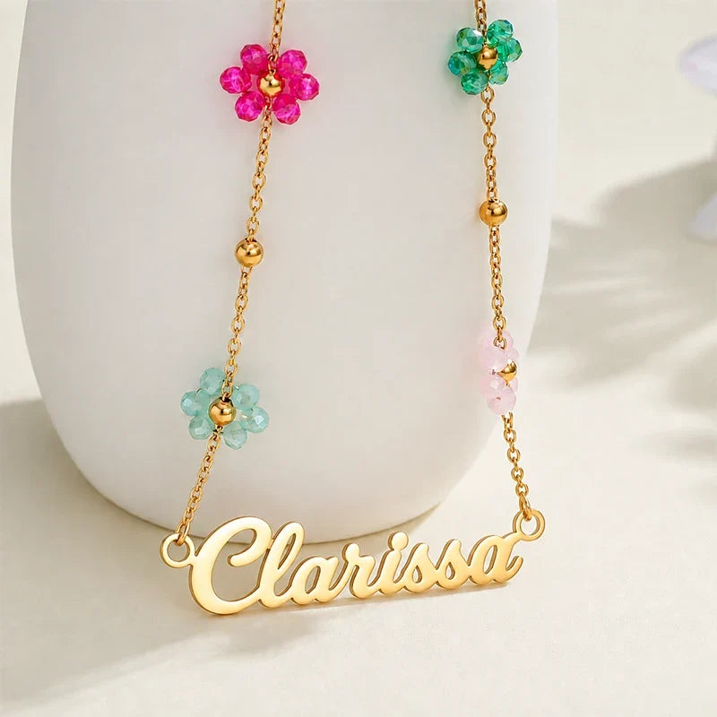 Kinderkette mit Namen und bunten Blumen